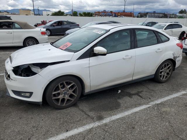 FORD FOCUS SE 2015 with VIN 1FADP3F26FL256146 - Photo from auction
