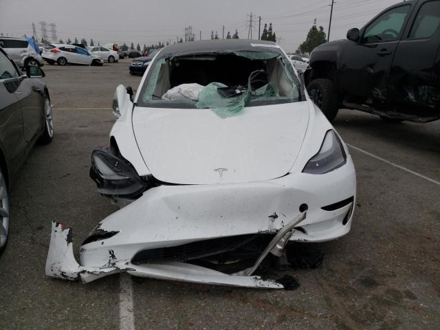 Photo 5 from auction – 2021 TESLA MODEL 3 with VIN 5YJ3E1EA3MF977890