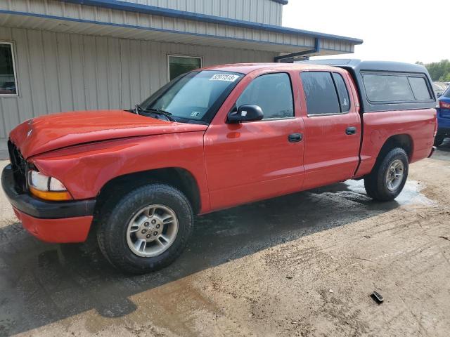 DODGE DAKOTA QUA 2000 with VIN 1B7GL2AN5YS597996 - Photo from auction