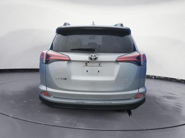 Photo 6 from auction – 2018 TOYOTA RAV4 LE with VIN 2T3BFREVXJW724596