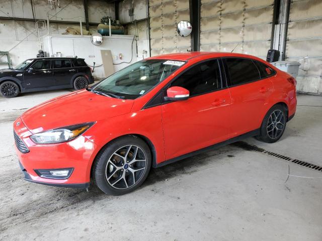 FORD FOCUS SE 2017 with VIN 1FADP3FE8HL310429 - Photo from auction