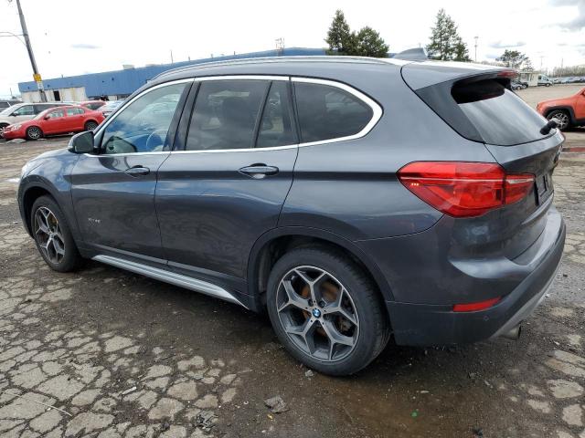 Photo 2 from auction – 2018 BMW X1 XDRIVE2 with VIN WBXHT3Z31J4A66842