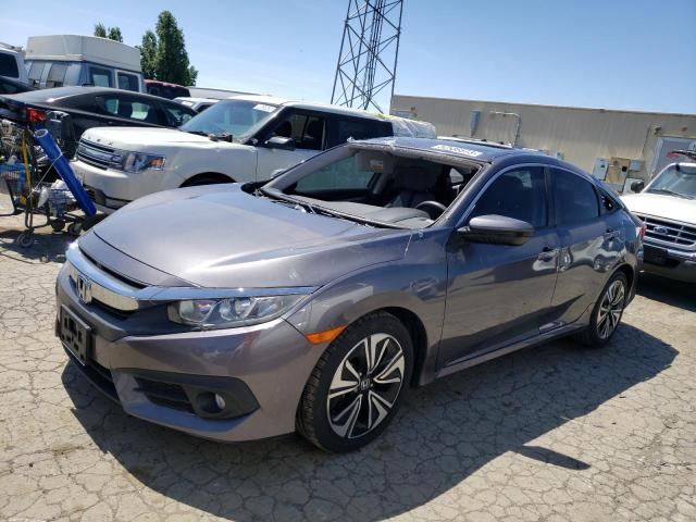 HONDA CIVIC EX 2017 with VIN 19XFC1F31HE200185 - Photo from auction