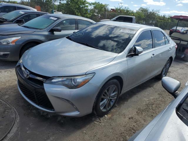 TOYOTA CAMRY LE 2017 with VIN 4T1BF1FK4HU334909 - Photo from auction