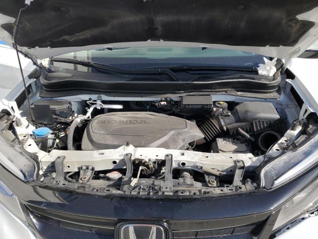 Photo 11 from auction – 2021 HONDA PILOT BLAC with VIN 5FNYF6H79MB066477