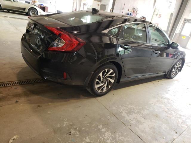 Photo 3 from auction – 2018 HONDA CIVIC EX with VIN 2HGFC2F79JH506877