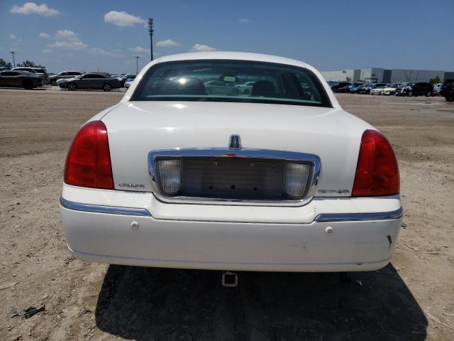 Photo 6 from auction – 2004 LINCOLN TOWN CAR E with VIN 1LNHM81W44Y669741