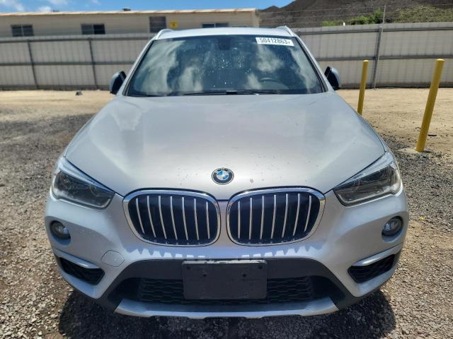 Photo 5 from auction – 2017 BMW X1 XDRIVE2 with VIN WBXHT3Z35H4A57362