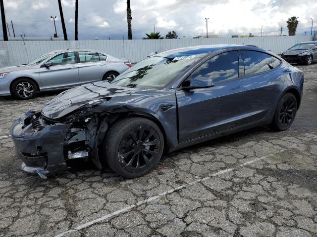 TESLA MODEL 3 2022 with VIN 5YJ3E1EB7NF322920 - Photo from auction