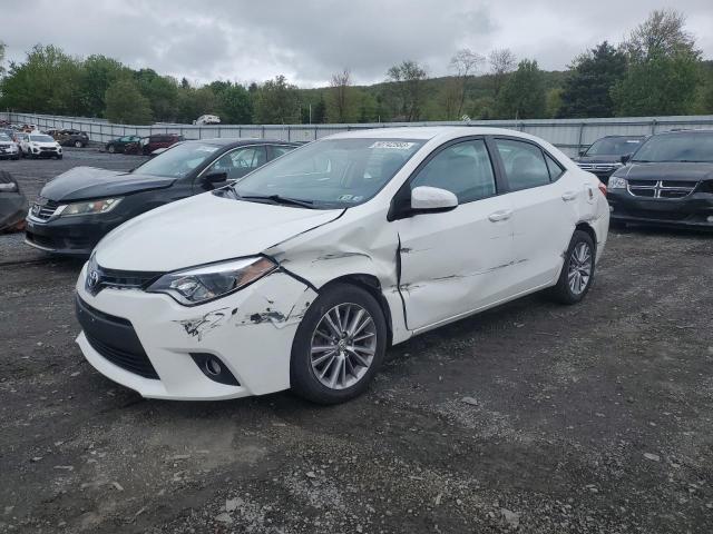 TOYOTA COROLLA L 2014 with VIN 5YFBURHE9EP146587 - Photo from auction