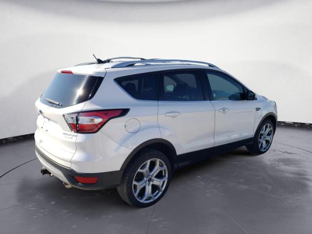 Photo 3 from auction – 2018 FORD ESCAPE TIT with VIN 1FMCU9J95JUC58894