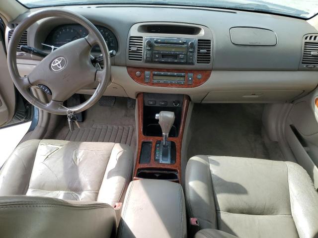 Photo 8 from auction – 2002 TOYOTA CAMRY LE with VIN JTDBF30K720055753
