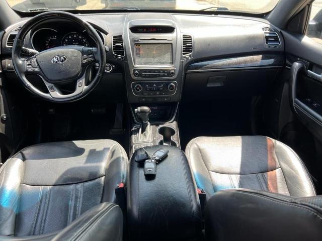 Photo 9 from auction – 2015 KIA SORENTO SX with VIN 5XYKWDA73FG645643