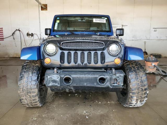 Photo 5 from auction – 2009 JEEP WRANGLER U with VIN 1J4GA59149L732352