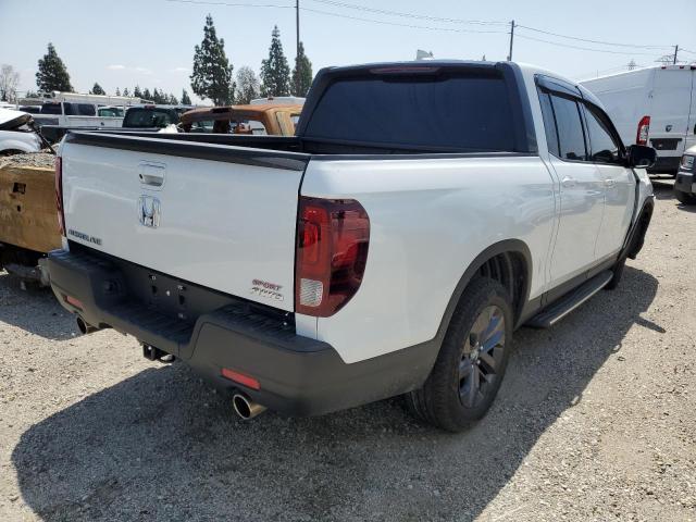 Photo 3 from auction – 2021 HONDA RIDGELINE with VIN 5FPYK3F15MB027403