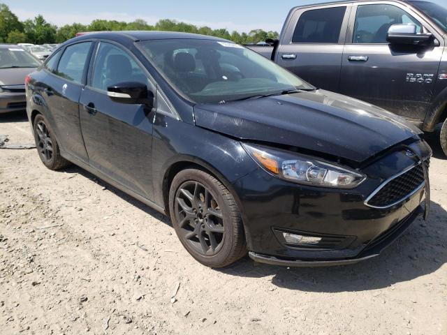 Photo 4 from auction – 2016 FORD FOCUS SE with VIN 1FADP3F24GL235491