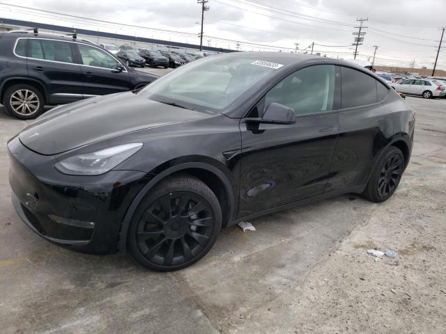 TESLA MODEL Y 2022 with VIN 7SAYGDEE9NF557897 - Photo from auction