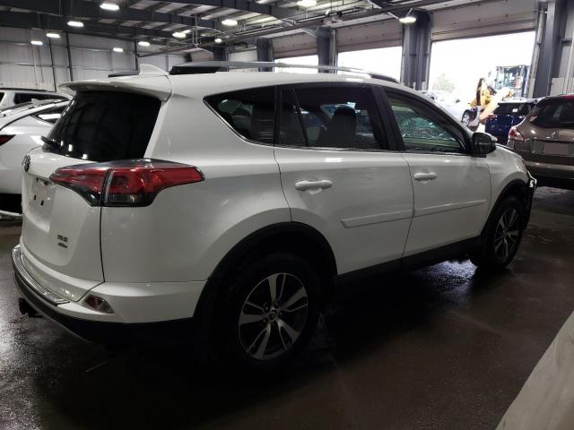 Photo 3 from auction – 2017 TOYOTA RAV4 XLE with VIN JTMRFREV8HJ162303