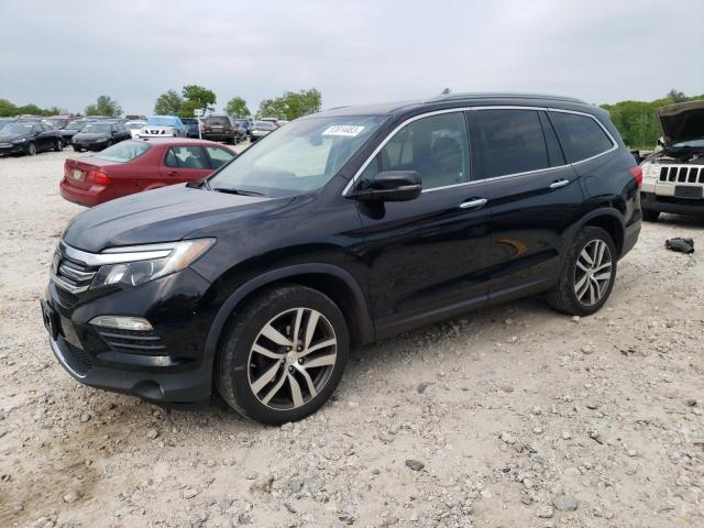 HONDA PILOT TOUR 2016 with VIN 5FNYF6H92GB127237 - Photo from auction