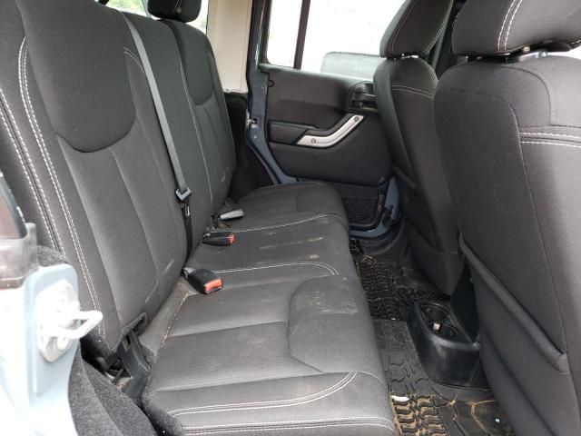 Photo 11 from auction – 2015 JEEP WRANGLER U with VIN 1C4BJWFG7FL515789