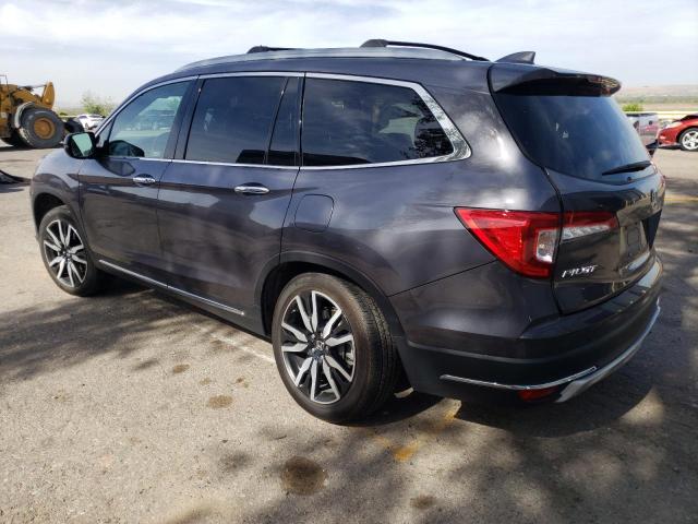 Photo 2 from auction – 2021 HONDA PILOT ELIT with VIN 5FNYF6H00MB017462