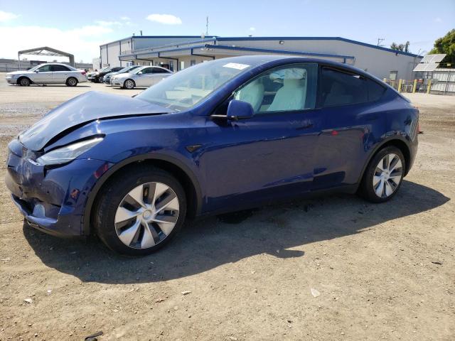 TESLA MODEL Y 2022 with VIN 7SAYGAEE7NF340654 - Photo from auction