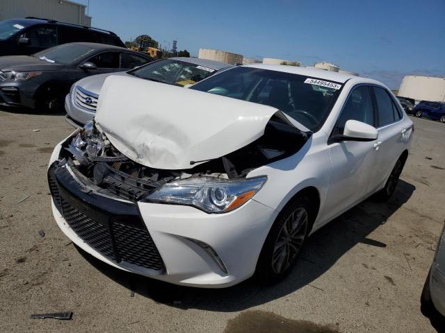 TOYOTA CAMRY LE 2017 with VIN 4T1BF1FK9HU365864 - Photo from auction