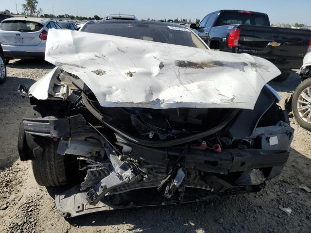 Photo 5 from auction – 2014 TESLA MODEL S with VIN 5YJSA1H11EFP43543