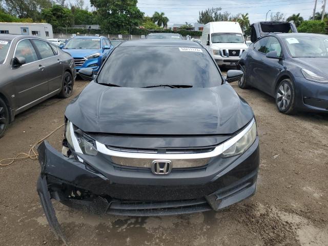 Photo 5 from auction – 2016 HONDA CIVIC LX with VIN 19XFC2F51GE021697