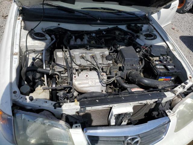 Photo 11 from auction – 2002 MAZDA 626 LX with VIN 1YVGF22C125288157