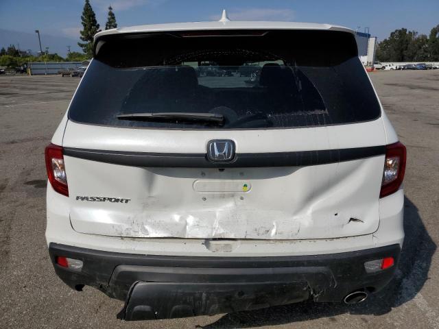 Photo 6 from auction – 2021 HONDA PASSPORT E with VIN 5FNYF7H59MB006767