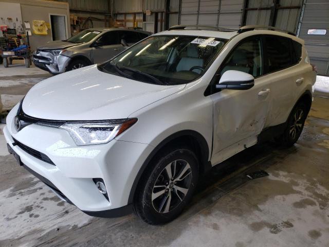 TOYOTA RAV4 XLE 2017 with VIN JTMRFREV4HJ172732 - Photo from auction