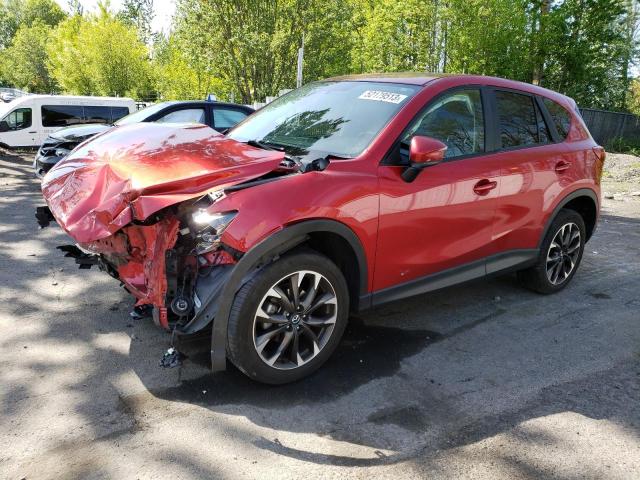 MAZDA CX-5 GT 2016 with VIN JM3KE4DY9G0794290 - Photo from auction