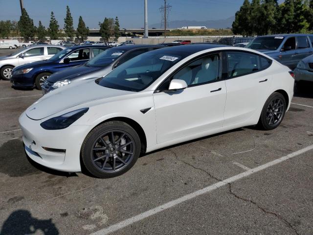 TESLA MODEL 3 2022 with VIN 5YJ3E1EB7NF249709 - Photo from auction