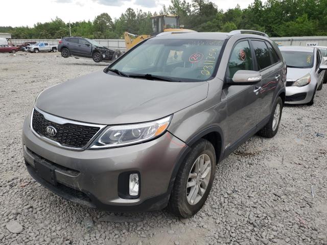 KIA SORENTO LX 2014 with VIN 5XYKTCA68EG521845 - Photo from auction