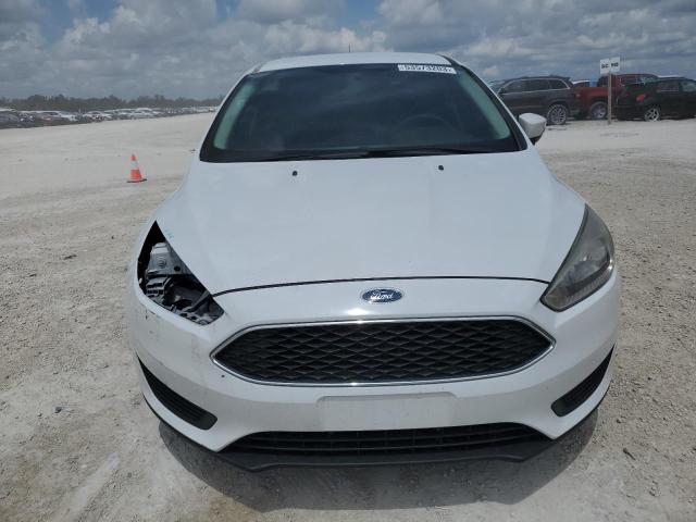 Foto 5 de la subasta – 2017 FORD FOCUS SE con VIN 1FADP3F24HL331221