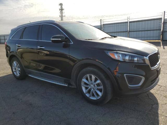 Photo 4 from auction – 2016 KIA SORENTO LX with VIN 5XYPG4A36GG166330