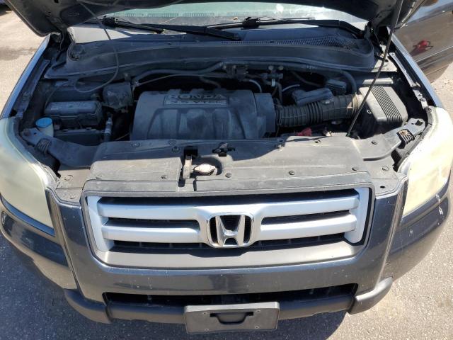 Photo 12 from auction – 2006 HONDA PILOT EX with VIN 2HKYF18516H538659