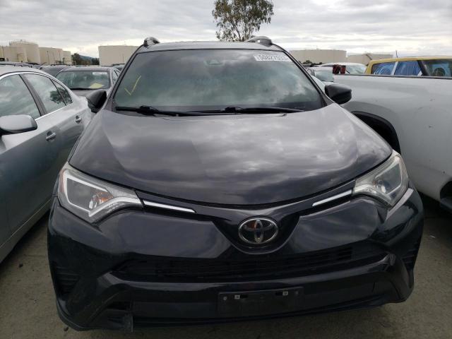 Photo 5 from auction – 2018 TOYOTA RAV4 LE with VIN 2T3ZFREV4JW433560