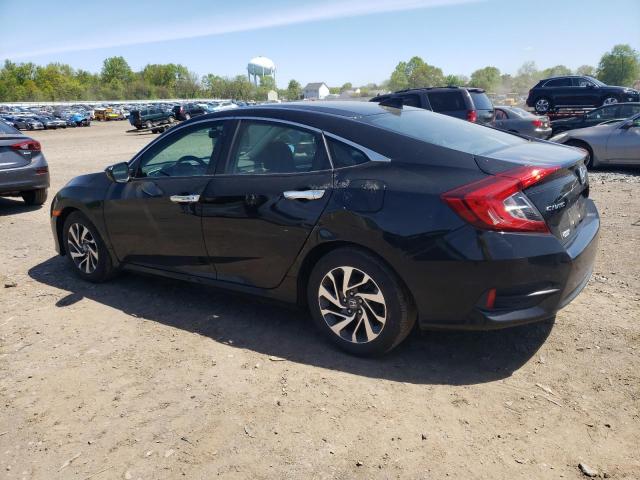 Photo 2 from auction – 2018 HONDA CIVIC EX with VIN 19XFC2F77JE200433