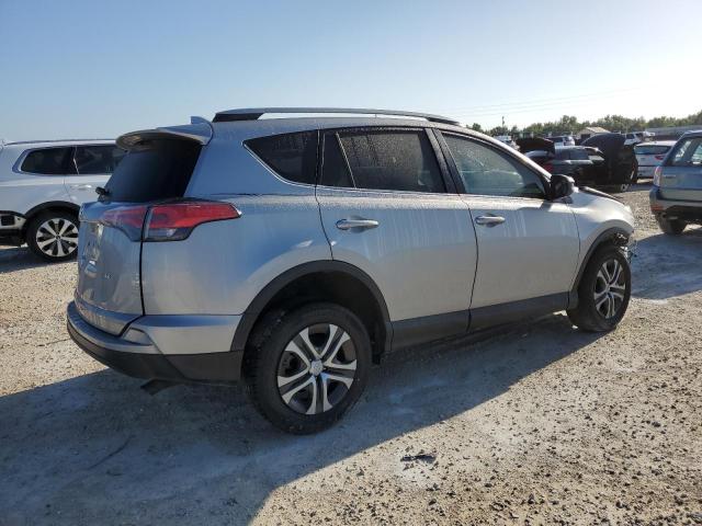 Photo 3 from auction – 2018 TOYOTA RAV4 LE with VIN 2T3ZFREV4JW465814