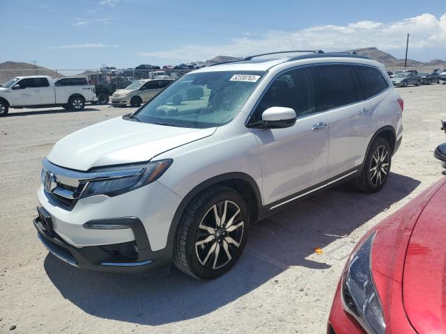 HONDA PILOT TOUR 2020 with VIN 5FNYF6H63LB002389 - Photo from auction