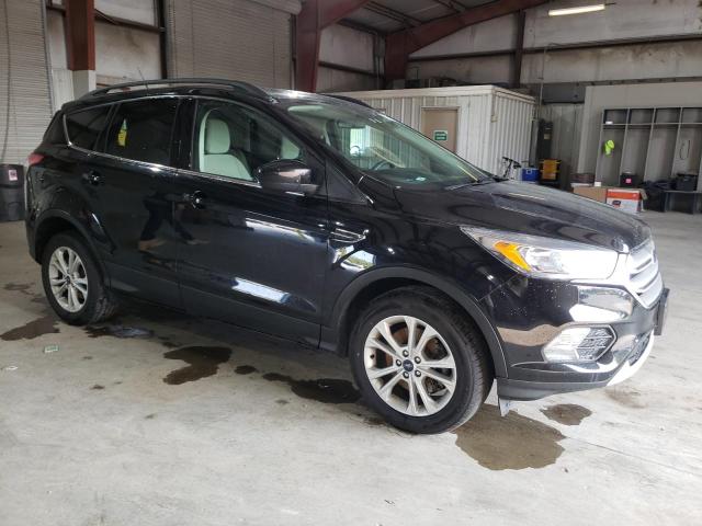 Photo 4 from auction – 2018 FORD ESCAPE SE with VIN 1FMCU9GD7JUB93574