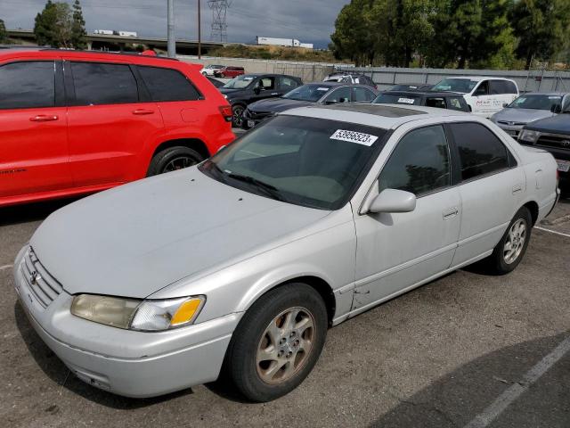 TOYOTA CAMRY LE 1997 with VIN JT2BF22K5V0074029 - Photo from auction