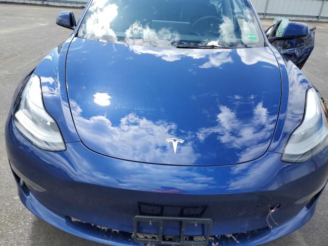 Photo 11 from auction – 2022 TESLA MODEL 3 with VIN 5YJ3E1EB3NF114579
