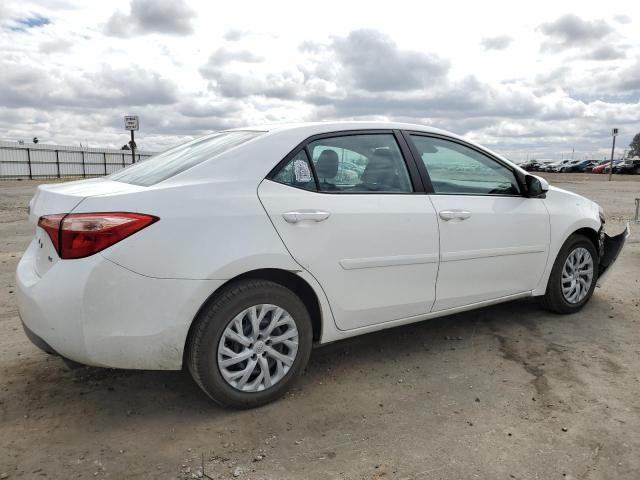 Photo 3 from auction – 2017 TOYOTA COROLLA L with VIN 5YFBURHE8HP618847