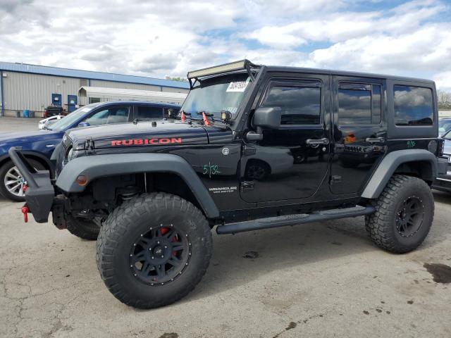 JEEP WRANGLER U 2015 with VIN 1C4HJWFG5FL564239 - Photo from auction