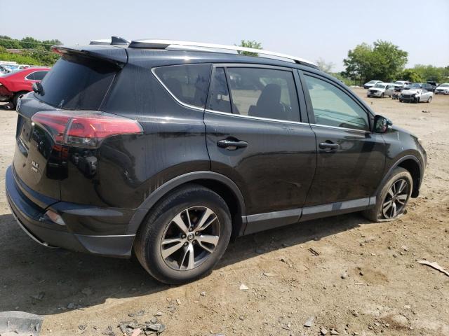 Photo 3 from auction – 2017 TOYOTA RAV4 XLE with VIN 2T3RFREV8HW590566