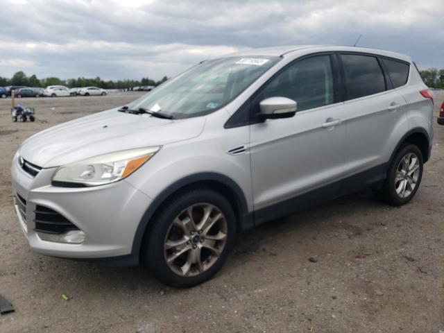 FORD ESCAPE SEL 2013 with VIN 1FMCU9H92DUA74815 - Photo from auction