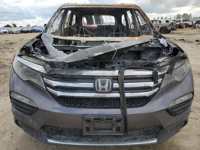 Photo 5 from auction – 2017 HONDA PILOT TOUR with VIN 5FNYF6H95HB019812